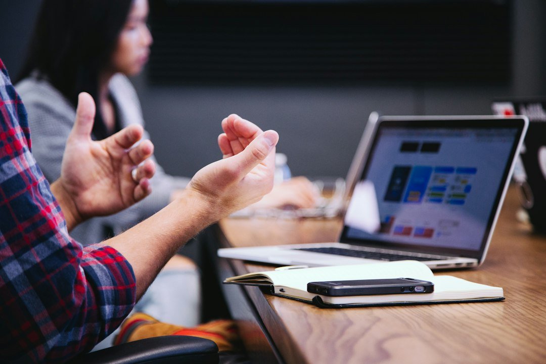 Agency team and client discussing a digital marketing project at a meeting table